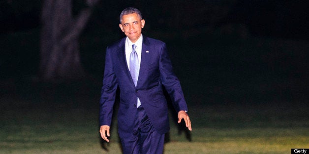 WASHINGTON, DC - MAY 13: U.S. President Barack Obama walks across the South Lawn of the White House after arriving aboard Marine One on May 13, 2013 in Washington, DC. The President was returning from New York City where he attended two DNC events at private residences and a joint DCCC/DSCC event at the Waldorf Astoria Hotel. (Photo by Pete Marovich-Pool/Getty Images)