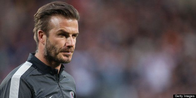 LYON, FRANCE - MAY 12: David Beckham of PSG warms up during the Ligue 1 match between Olympique Lyonnais, OL, and Paris Saint-Germain FC, PSG, at the Stade Gerland on May 12, 2013 in Lyon, France. (Photo by John Berry/Getty Images)