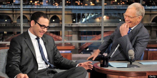 NEW YORK - APRIL 24: A.J. Clemente explains to Late Show host David Letterman how he got fired on his first day from his television anchor job in Bismarck, ND during Wednesday's taping in New York. (Photo by John Paul Filo/CBS via Getty Images)
