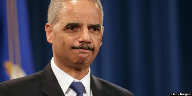 WASHINGTON, DC - MAY 14: U.S. Attorney General Eric Holder holds a Medicare fraud news conference at which he said he recused himself last year from a national security leak probe in which prosecutors obtained the phone records of Associated Press journalists at the Justice Department May 14, 2013 in Washington, DC. Holder faced a large number of questions about his department's investigation targeting phone records and data from the Associated Press. (Photo by Chip Somodevilla/Getty Images)