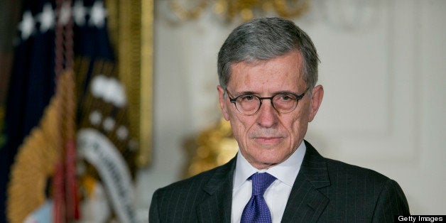 Thomas 'Tom' Wheeler, managing director of Core Capital Partners LP and U.S. President Barack Obama's nominee as chairman of the Federal Communications Commission (FCC), listens as Obama, not pictured, makes the announcement in the State Dining Room of the White House in Washington, D.C., U.S. on Wednesday, May 1, 2013. Wheeler would succeed Chairman Julius Genachowski, a Democrat who has pushed to expand access to high-speed Internet service. Photographer: Andrew Harrer/Bloomberg via Getty Images 