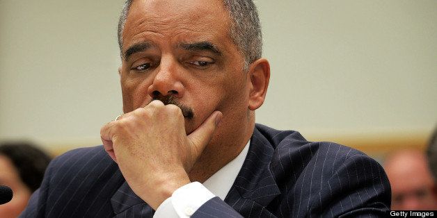 WASHINGTON, DC - MAY 15: Attorney General Eric Holder faces the House Judiciary committee about journalists phone records and IRS improprieties, on May, 15, 2013 in Washington, DC. (Photo by Bill O'Leary/The Washington Post via Getty Images)