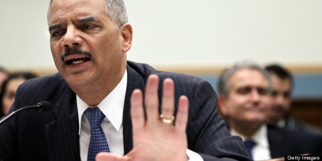 WASHINGTON, DC - MAY 15: U.S. Attorney General Eric Holder testifies during a hearing before the House Judiciary Committee on oversight of the U.S. Department of Justice May 15, 2013 on Capitol Hill in Washington, DC. Holder faced questions on reports of the subpoena of two months worth of Associated Press journalists' phone records and the Internal Revenue Services' scrutiny of conservative organization's tax exemption requests. (Photo by Alex Wong/Getty Images)