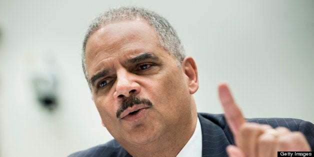 US Attorney General Eric H. Holder testifies during a hearing of the House Judiciary Committee on Capitol Hill May 15, 2013 in Washington, DC. Holder and other members of the Obama administration are being criticized over reports of the Internal Revenue Services'(IRS) scrutiny of conservative organization's tax exemption requests and the subpoena of two months worth of Associated Press journalists' phone records. AFP PHOTO/Brendan SMIALOWSKI (Photo credit should read BRENDAN SMIALOWSKI/AFP/Getty Images)