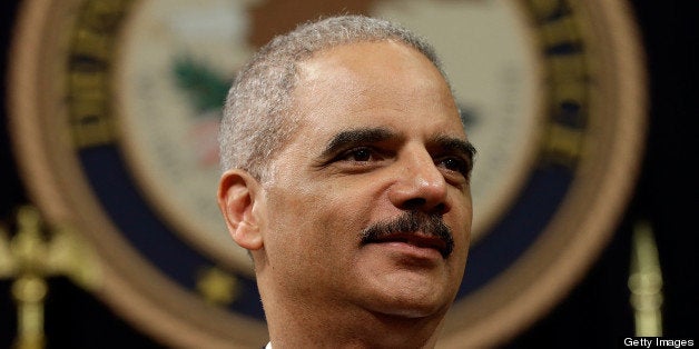 WASHINGTON, DC - MAY 28: U.S. Attorney General Eric Holder speaks during a naturalization ceremony at the U.S. Department of Justice May 28, 2013 in Washington, DC. During the event Citizenship and Immigration Services Director Alejandro Mayorkas administered the Oath of Citizenship to approximately 70 new U.S. citizens. (Photo by Win McNamee/Getty Images)