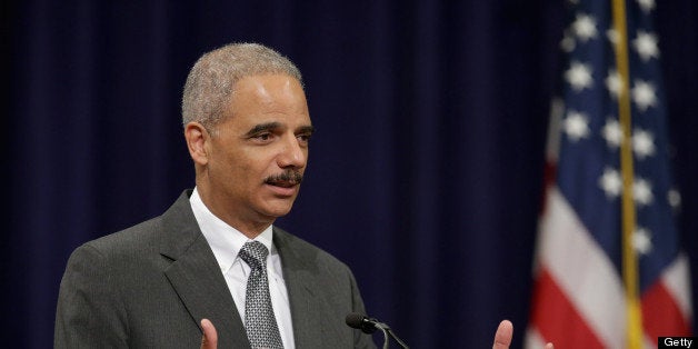 WASHINGTON, DC - MAY 29: U.S. Attorney General Eric Holder delivers remarks during the Justice Department Inspector General's annual awards ceremony in the Great Hall at the Robert F. Kennedy Department of Justice building May 29, 2013 in Washington, DC. After it was revealed that the Justice Department was investigating journalists from the Associated Press and FOX News, the department began contacting major print and broadcast news organization bureau chiefs to set up a meeting this week with Holder to discuss changes to guidelines for subpoenas to news organizations. (Photo by Chip Somodevilla/Getty Images)