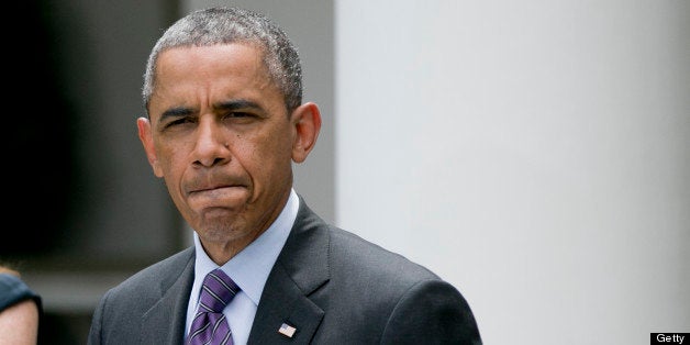 U.S. President Barack Obama pauses while speaks during a nomination announcement in the Rose Garden of the White House in Was