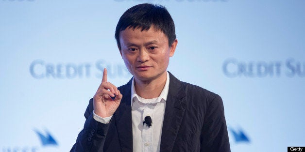 Jack Ma, chairman of Alibaba Group Holding Ltd., gestures as he speaks during the Credit Suisse Asian Investment Conference in Hong Kong, China, on Wednesday, March 20, 2013. Alibaba says it accounts for five percent of the China retail market. Photographer: Jerome Favre/Bloomberg via Getty Images 