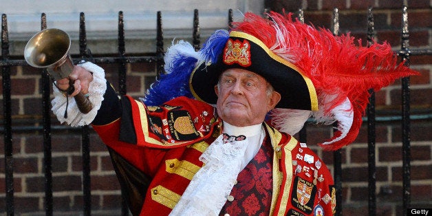 Town Crier Tony Appleton announces the birth of Prince William and Catherine Duchess of Cambridge's baby boy outside of the Lindo Wing of St Mary's Hospital in London, on July 22, 2013. Prince William's wife Kate gave birth to a baby boy today, providing Britain's royal family with a future king in an event that had been anticipated around the world, Kensington palace said. AFP PHOTO / BEN STANSALL (Photo credit should read BEN STANSALL/AFP/Getty Images)