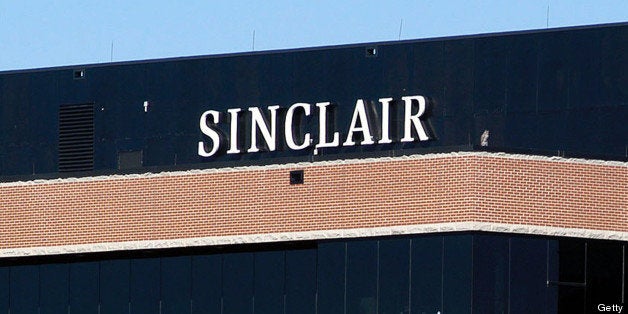 HUNT VALLEY, MD - OCTOBER 12: A sign on the Sinclair Broadcast building is seen in a buisness district October 12, 2004 in Hunt Valley, Maryland. Sinclair Broadcast Group, the owner of the largest chain of television stations in the nation, plans to preempt regular programming two weeks before the Nov. 2 election to air a documentary that accuses John Kerry of betraying American prisoners during the Vietnam War. (Photo by William Thomas Cain/Getty Images)