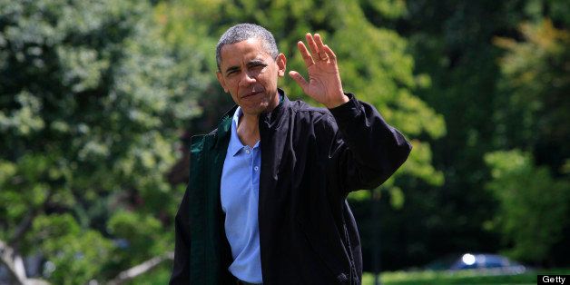 WASHINGTON, DC - AUGUST 04: U.S. President Barack Obama waves as he arrives by Marine One at the White House after returning from Camp David on August 4, 2013 in Washington, DC. Obama is celebrating his 52rd birthday. (Photo by Dennis Brack-Pool/Getty Images)