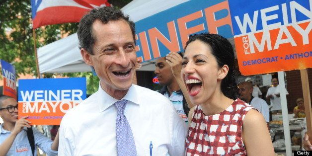 Mayorial candidate Anthony Weiner and his wife Huma Abedin campaigning on W. 111 St. (Photo by Andrew Savulich/NY Daily News via Getty Images)