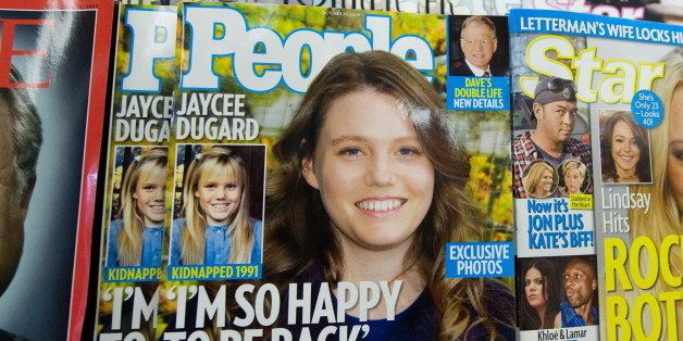 People Magazine's October 26 issue with recently freed kidnapping victim Jaycee Dugard on the cover, appears on a newstand in Washington on October 16, 2009. This is the first time a current image of Dugard has been published since she was kidnapped by a sex offender in Lake Tahoe in 1991 as an eleven-year-old. AFP PHOTO/Saul LOEB (Photo credit should read SAUL LOEB/AFP/Getty Images)