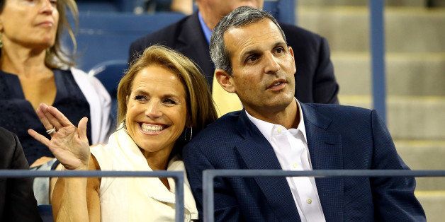 NEW YORK, NY - SEPTEMBER 04: Television personality Katie Couric and fiancee John Molner watch a women's singles quarter final match between Daniela Hantuchova of Slovakia and Victoria Azarenka of Belarus on Day Ten of the 2013 US Open at the USTA Billie Jean King National Tennis Center on September 4, 2013 in the Flushing neighborhood of the Queens borough of New York City. (Photo by Al Bello/Getty Images)
