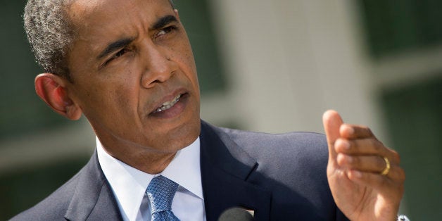 US President Barack Obama speaks about Syria from the Rose Garden at the White House in Washington, DC, on August 31, 2013. Obama said Saturday he will ask the US Congress to authorize military action against Syria, lifting the threat of immediate strikes on President Bashar al-Assad's regime. Obama said he had decided he would go ahead and launch military action on Syria, but he believed it was important for American democracy to win the support of lawmakers. AFP PHOTO/Jim WATSON (Photo credit should read JIM WATSON/AFP/Getty Images)