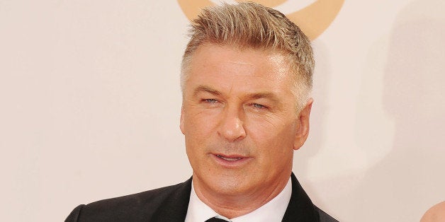 LOS ANGELES, CA- SEPTEMBER 22: Actor Alec Baldwin and daughter Ireland Baldwin arrive at the 65th Annual Primetime Emmy Awards at Nokia Theatre L.A. Live on September 22, 2013 in Los Angeles, California.(Photo by Jeffrey Mayer/WireImage)