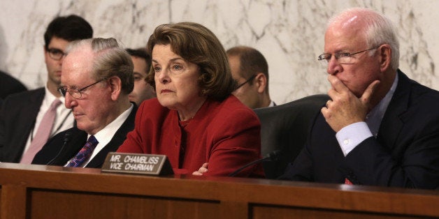 WASHINGTON, DC - SEPTEMBER 26: Committee chairman Sen. Dianne Feinstein (D-CA) (C), ranking member Sen. Saxby Chambliss (R-GA) (R) and Sen. John Rockefeller (D-WV) (L) listen during a hearing before the Senate (Select) Intelligence Committee September 26,2 103 on Capitol Hill in Washington, DC. The hearing was focused on the FISA (Foreign Intelligence Surveillance Act) Legislation. (Photo by Alex Wong/Getty Images)