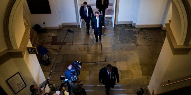 WASHINGTON, DC - SEPTEMBER 28: Greeted by journalists, Speaker of the House John Boehner (R-OH) arrives to the US Capitol for a day of meetings concerning the House's Continuing Resolution spending bill, to fund the government at a $986 billion annual level through Nov. 15, with the defunding of the Affordable Care Act removed by the Senate, on Capitol Hill Saturday September 28, 2013. (Photo by Melina Mara/The Washington Post via Getty Images)