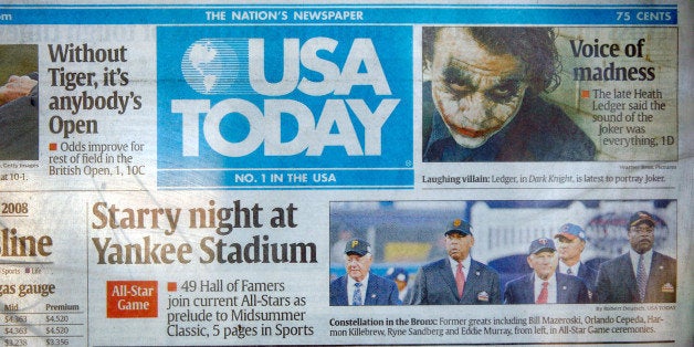 LONG BEACH, CA - JULY 16: A USA Today newspaper is seen on a stand July 16, 2008 in Long Beach, California. Second-quarter profits for USA Today's owner, Gannett Co., the largest newspaper publisher in the U.S., dropped 36 percent after advertising sales at USA Today fell 27 percent in June, the steepest monthly decline this year. Overall, ad dollars for Gannett publications have fallen 16 percent. (Photo by David McNew/Getty Images)