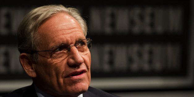 Associate Editor of the Washington Post Bob Woodward speaks at the Newseum during an event marking the 40th anniversary of Watergate at the Newseum in Washington, DC June 13, 2012. Nearly four decades after the infamous Watergate break-in, Woodward and Carl Bernstein, the reporters who broke the story have concluded that then-president Richard Nixon was 'far worse' than they thought. Nixon resigned in August 1974 for his administration's role in a June 17, 1972, burglary of the Democratic National Committee headquarters at the Watergate complex in the US capital and the subsequent cover-up. He became the only American president ever to resign the office AFP PHOTO/Jim Watson (Photo credit should read JIM WATSON/AFP/GettyImages)