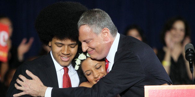 NEW YORK, NY - NOVEMBER 05: (L-R) Dante De Blasio, Chiara De Blasio and Bill DeBlasio celebrate winning the New York City mayoral election on November 5, 2013 in Brooklyn, New York City. (Photo by Steve Sands/WireImage)