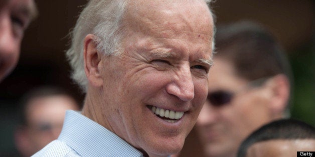 SOUTH BOSTON, MA - JUNE 22: Vice President Joe Biden talks with members of the public outside Sullivan's Castle Island while campaigning with Rep. Ed Markey in South Boston on Saturday, June 22, 2013. Both Democratic candidate Ed Markey and Republican candidate Gabriel Gomez are keeping busy schedules in the final weekend before the special election for the U.S. Senate, with both campaigns trying to rally supporters and mobilize for a get-out-the-vote effort. (Photo by Colm O'Molloy for The Boston Globe via Getty Images)