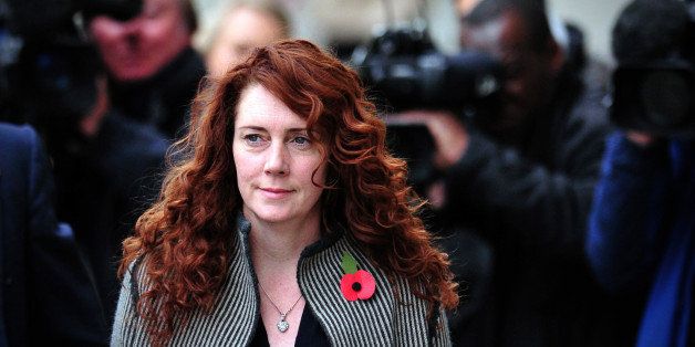 Rebekah Brooks, former News International chief executive, arrives for the phone-hacking trial at the Old Bailey court in London on November 6, 2013. AFP PHOTO/CARL COURT (Photo credit should read CARL COURT/AFP/Getty Images)