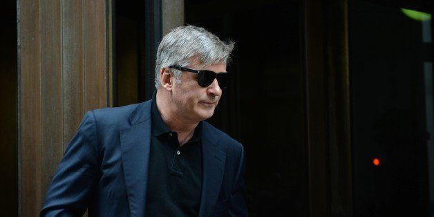 Actor Alec Baldwin leaves Manhattan Criminal Court after testifying against accused stalker Canadian actress Genevieve Sabourin November 12, 2013 in New York. AFP PHOTO/Stan HONDA (Photo credit should read STAN HONDA/AFP/Getty Images)