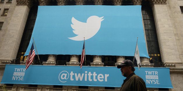 A banner with the logo of Twitter is set on the front of the New York Stock Exchange (NYSE) on November 7, 2013 in New York. Twitter hit Wall Street with a bang on Thursday, as an investor frenzy quickly sent shares surging after the public share offering for the fast-growing social network. In the first exchanges, Twitter vaulted 80.7 percent to $47, a day after the initial public offering (IPO) at $26 per share. While some analysts cautioned about the fast-changing nature of social media, the debut led to a stampede for Twitter shares. AFP PHOTO/EMMANUEL DUNAND (Photo credit should read EMMANUEL DUNAND/AFP/Getty Images)