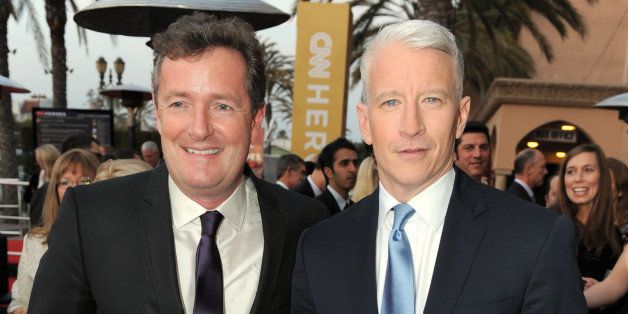 CNN Hosts Piers Morgan and Anderson Cooper arrive at 2011 CNN Heroes: An All-Star Tribute at The Shrine Auditorium on December 11, 2011 in Los Angeles, California. 21959_008_JS2_0343.JPG