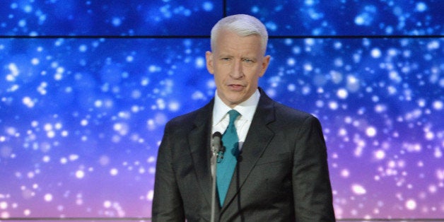 NEW YORK, NY - NOVEMBER 19: Anderson Cooper speaks onstage at 2013 CNN Heroes: An All Star Tribute at The American Museum of Natural History on November 19, 2013 in New York City. 24079_013_0439.JPG (Photo by Theo Wargo/WireImage) 