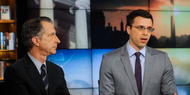 MEET THE PRESS -- Pictured: (l-r) Dan Henninger, Columnist, Wall Street Journal, left, and Ezra Klein, Columnist, The Washington Post & Bloomberg, right, appear on 'Meet the Press' in Washington, D.C., Sunday, Nov. 17, 2013. (Photo by: William B. Plowman/NBC/NBC NewsWire via Getty Images)