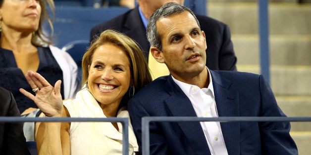 NEW YORK, NY - SEPTEMBER 04: Television personality Katie Couric and fiancee John Molner watch a women's singles quarter final match between Daniela Hantuchova of Slovakia and Victoria Azarenka of Belarus on Day Ten of the 2013 US Open at the USTA Billie Jean King National Tennis Center on September 4, 2013 in the Flushing neighborhood of the Queens borough of New York City. (Photo by Al Bello/Getty Images)