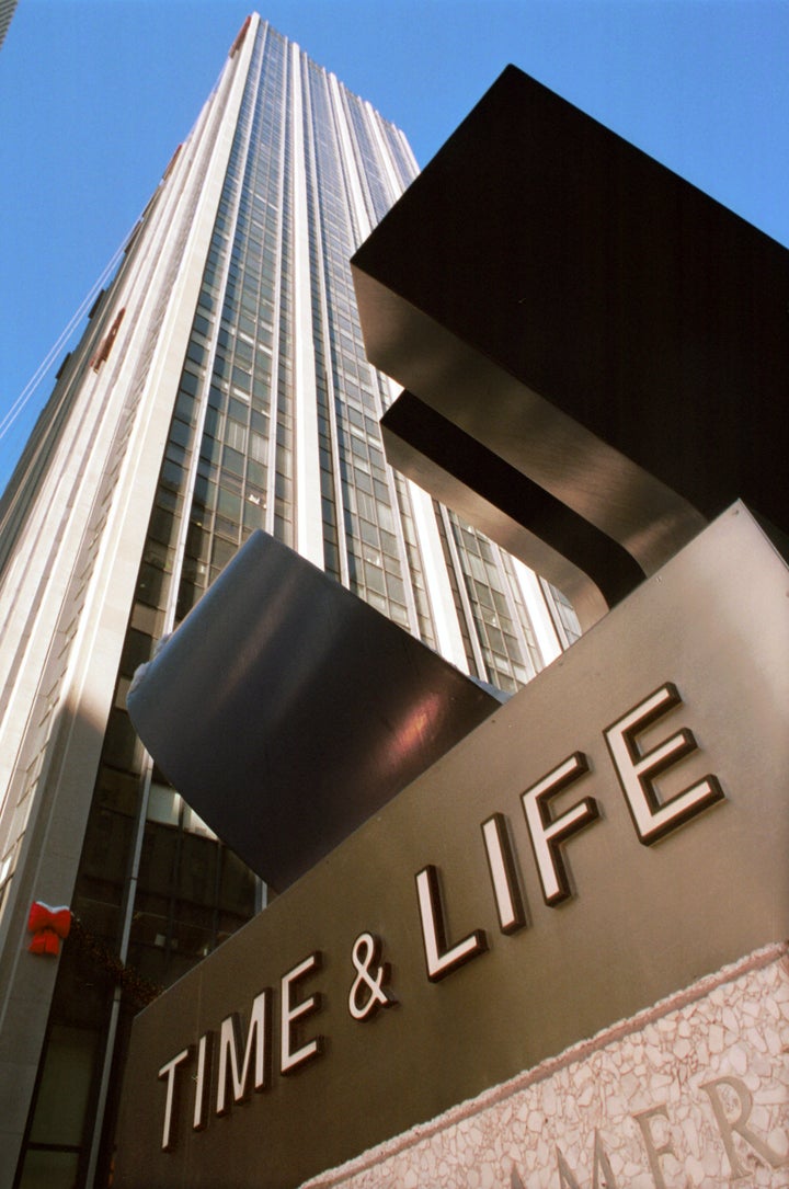 383866 01: The Time & Life Building looms high on the Avenue of the Americas January 3, 2001 in New York City. (Photo by Spen