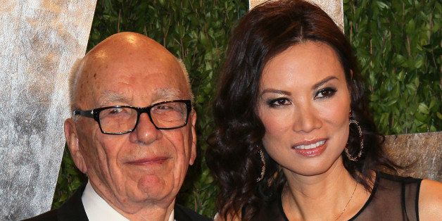 WEST HOLLYWOOD, CA - FEBRUARY 24: Media mogul Rupert Murdoch (L) and wife Wendi Deng Murdock attend the 2013 Vanity Fair Oscar Party at the Sunset Tower Hotel on February 24, 2013 in West Hollywood, California. (Photo by David Livingston/Getty Images)