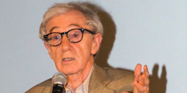 PARIS, FRANCE - AUGUST 27: Director Woody Allen speaks on stage during the Paris premiere of 'Blue Jasmine' at UGC Cine Cit