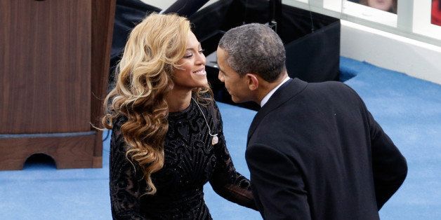 WASHINGTON, DC - JANUARY 21: U.S. President Barack Obama greets singer Beyonce after she performs the National Anthem during the public ceremonial inauguration on the West Front of the U.S. Capitol January 21, 2013 in Washington, DC. Barack Obama was re-elected for a second term as President of the United States. (Photo by Rob Carr/Getty Images)
