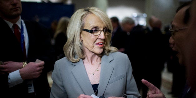 UNITED STATES - FEBRUARY 22: Arizona Governor Jan Brewer speaks with attendees of the National Governors Association Winter Meeting at the JW Marriott in Washington on Saturday, Feb. 22, 2014. (Photo By Bill Clark/CQ Roll Call)