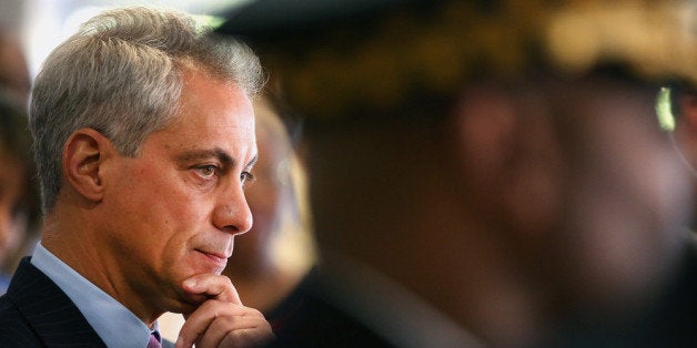 CHICAGO, IL - SEPTEMBER 10: Chicago Mayor Rahm Emanuel listens as Police Superintendent Garry McCarthy speaks at a press conference on September 10, 2013 in Chicago, Illinois. Emanuel and McCarthy called the press conference to announce an expansion of the citys police foot patrols in 20 of the city's most dangerous neighborhoods. They claim foot patrols have helped to reduce homicides and shootings in those areas by about 25 percent from last year. Last year Chicago had more than 500 homicides and more than 2500 shootings. (Photo by Scott Olson/Getty Images)