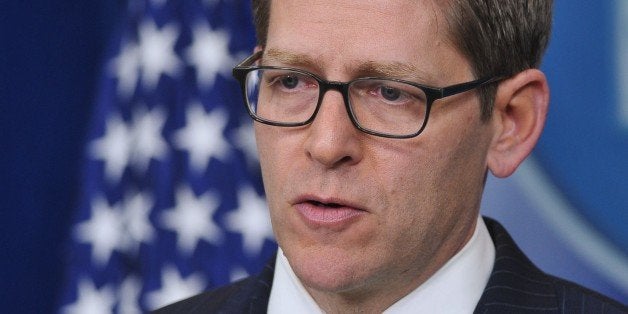 White House Press Secretary Jay Carney responds to a question regarding Malaysia Airlines flight MH370 in the Brady Briefing Room of the White House on March 14, 2014 in Washington, DC. AFP PHOTO/Mandel NGAN (Photo credit should read MANDEL NGAN/AFP/Getty Images)