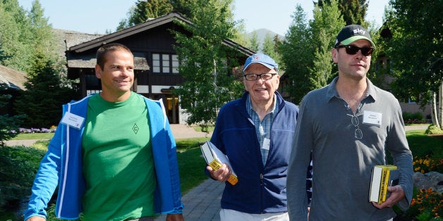 SUN VALLEY, ID - JULY 12: Lachlan Murdoch (L) and James Murdoch (R) with their father, Rupert Murdoch (C), Chairman and CEO o