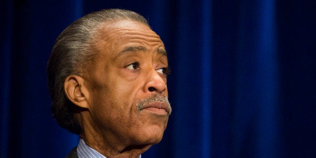 WASHINGTON, DC - JANUARY 20: Rev. Al Sharpton listens as U.S. Vice President Joe Biden (not seen) speaks during the National Action Network's annual King Day Breakfast, at The Mayflower Hotel, January 20, 2014 in Washington, DC. On Monday, Americans honor the birth of civil rights leader Martin Luther King, Jr. (Drew Angerer/Getty Images)