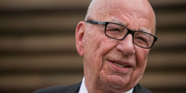 Rupert Murdoch arrives to the 2014 Vanity Fair Oscar Party on Sunday, March 2, 2014 in West Hollywood, California. AFP PHOTO/ADRIAN SANCHEZ-GONZALEZ (Photo credit should read ADRIAN SANCHEZ-GONZALEZ/AFP/Getty Images)