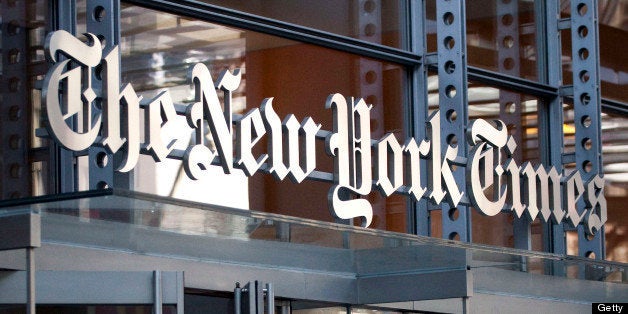 New York Times Co. signage is displayed on the company's building in New York, U.S., on Wednesday, April 27, 2011. New York Times Co., publisher of the namesake newspaper, said more than 100,000 people signed up for new digital subscriptions, a sign online revenue may help offset a decline in print advertising and circulation. Photographer: Michael Nagle/Bloomberg via Getty Images