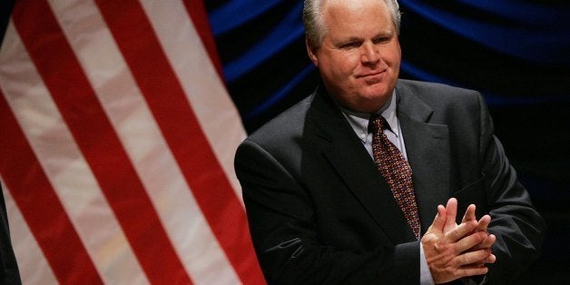 WASHINGTON - JUNE 23: Radio personality Rush Limbaugh interacts with the audience before the start of a panel discussion ''24' and America's Image in Fighting Terrorism: Fact, Fiction, or Does It Matter?', June 23, 2006 in Washington, DC. Radio personality Rush Limbaugh moderated a discussion sponsored by the Heritage Foundation titled and included members of the cast from the television show '24'. (Photo by Win McNamee/Getty Images)