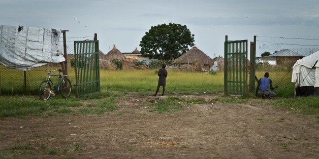 A returnee is standing at the entrance of Way Station in South Sudan's Upper Nile State Malakal on September 26, 2012. Malaka
