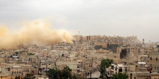 ALEPPO, SYRIA - MAY 8: At least 50 Assad forces killed in a bomb attack by members of Islamic Front in target of Carlton Citadel Hotel Aleppo, headquarters Assad forces near the Citadel of Aleppo in Aleppo, second big city of Syria on May 8, 2014. (Photo by Salih Mahmud Leyla/Anadolu Agency/Getty Images)