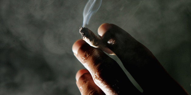 SAN FRANCISCO - NOVEMBER 29: Jonathan Beaver of San Francisco holds a marijuana cigarette at the San Francisco Patients Cooperative, a medical cannabis cooperative, November 29, 2004 in San Francisco, California. The U.S. Supreme Court is considering whether people who have a doctor's recommendation to use medicinal marijuana in 11 states with medical marijuana laws, can get around a federal ban on using marijuana. (Photo by Justin Sullivan/Getty Images)