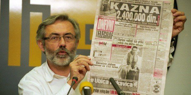 This picture taken on November 1998 shows the editor and owner of the daily newspaper 'Dnevni Telegraf' Slavko Curuvija at a press conference in Belgrade. Serbian police arrested on January 14, 2014 two former intelligence officers suspected of involvement in the murder of journalist Slavko Curuvija, a fierce critic of late strongman Slobodan Milosevic, a government source said. Curuvija was killed in front of his home in central Belgrade by unknown gunmen on the Orthodox Easter in April 1999, during NATO's bombing campaign against the former Yugoslavia over Kosovo. AFP PHOTO / ANDREJ ISAKOVIC (Photo credit should read ANDREJ ISAKOVIC/AFP/Getty Images)