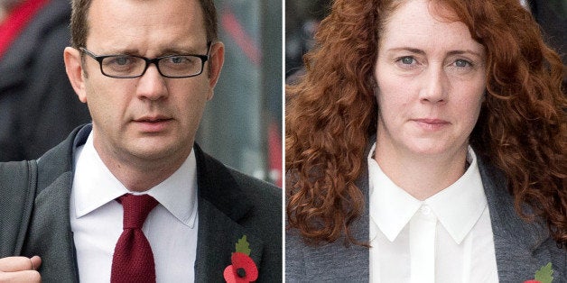 A combination of pictures created on October 31, 2013 shows Former News of the World editor and Downing Street communications chief Andy Coulson (L) and Rebekah Brooks (R), former News International chief executive, arriving for the phone-hacking trial at the Old Bailey court in London on October 31, 2013. The two most prominent defendants in Britain's phone-hacking trial, former News of the World editors Rebekah Brooks and Andy Coulson, had a six-year affair, prosecutors said on October 31, 2013. Lawyer Andrew Edis told London's Old Bailey court that the pair were lovers from at least 1998 to 2004, which includes the period they worked together at the Rupert Murdoch-owned tabloid. AFP PHOTO / LEON NEAL (Photo credit should read LEON NEAL/AFP/Getty Images)